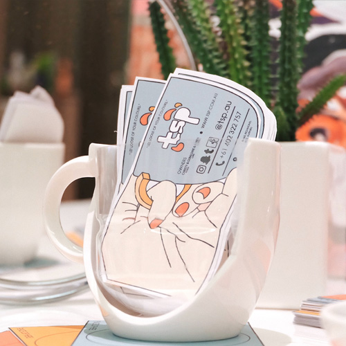 Image of business cards in a cup