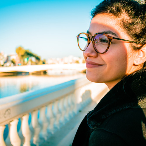 Girl with glasses smiling